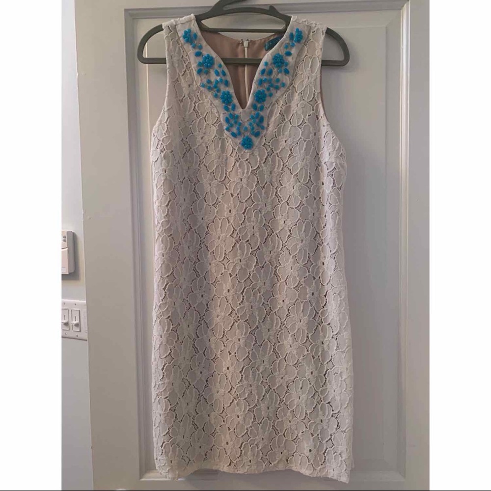 Lace dress with turquoise bead embellishment